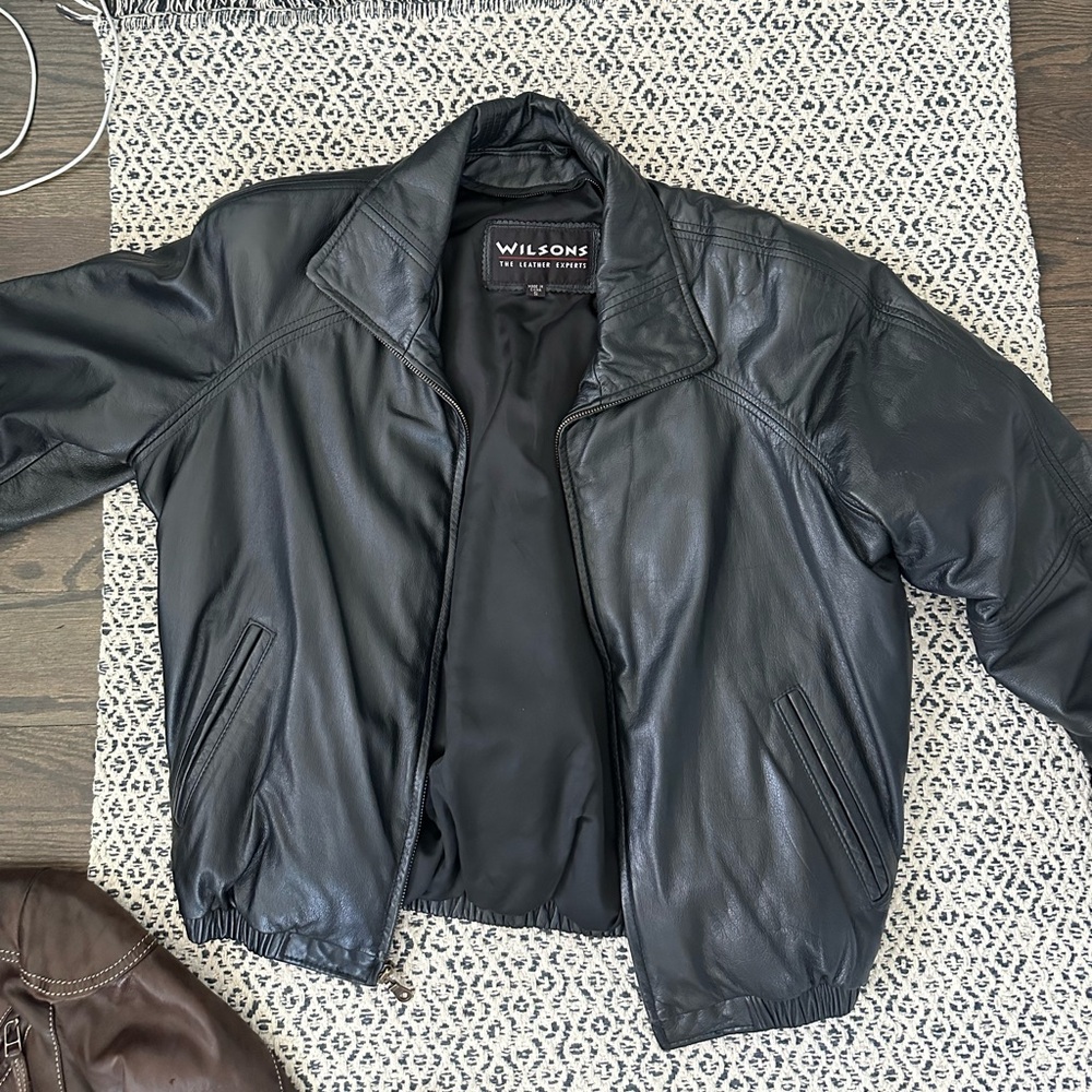 Wilson’s black leather jacket
